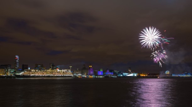 Fireworks light up the docked Queen Victoria